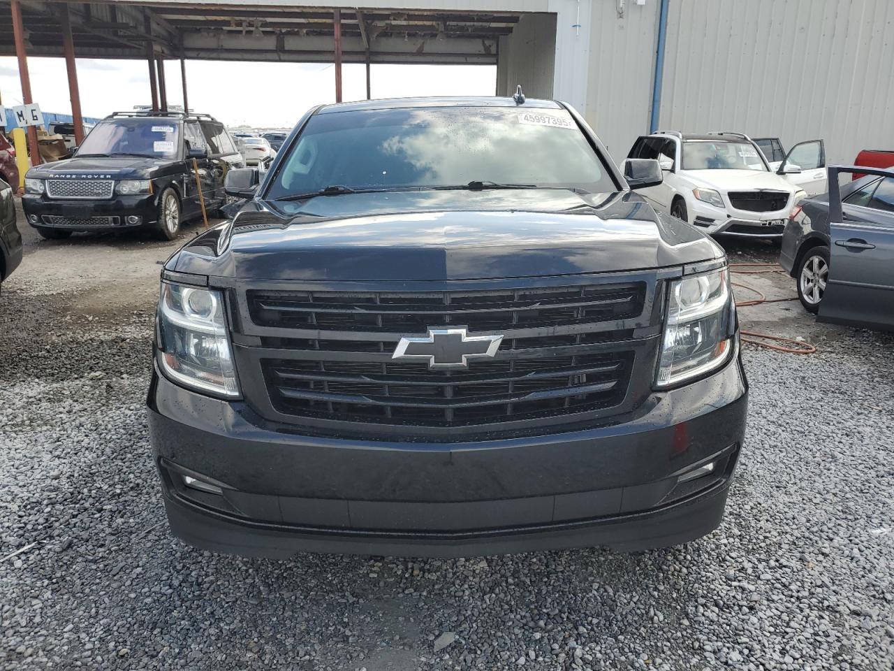 2018 Chevrolet Tahoe VIN 1GNSCCKJ1JR265084 Copart auction photo, side damage thumbnail 5
