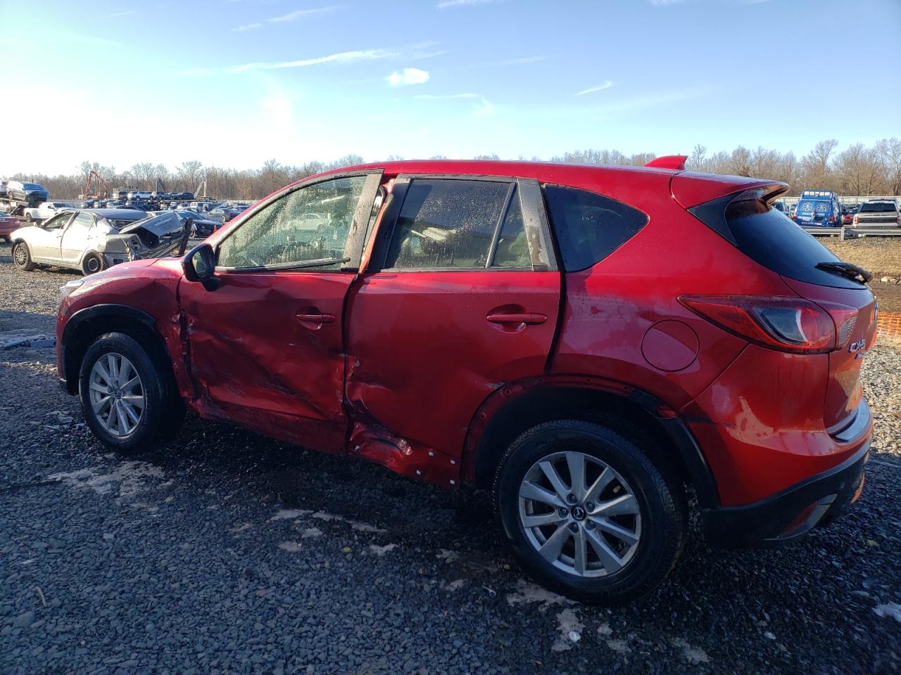 2015 Mazda CX-5 VIN JM3KE4CY9F0518899 Copart auction photo, side / rear end damage thumbnail 2