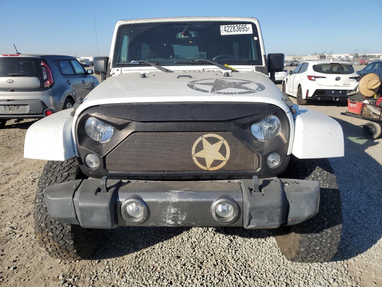 2015 Jeep Wrangler VIN 1C4HJWDG2FL614713 Copart auction photo, all over damage thumbnail 5