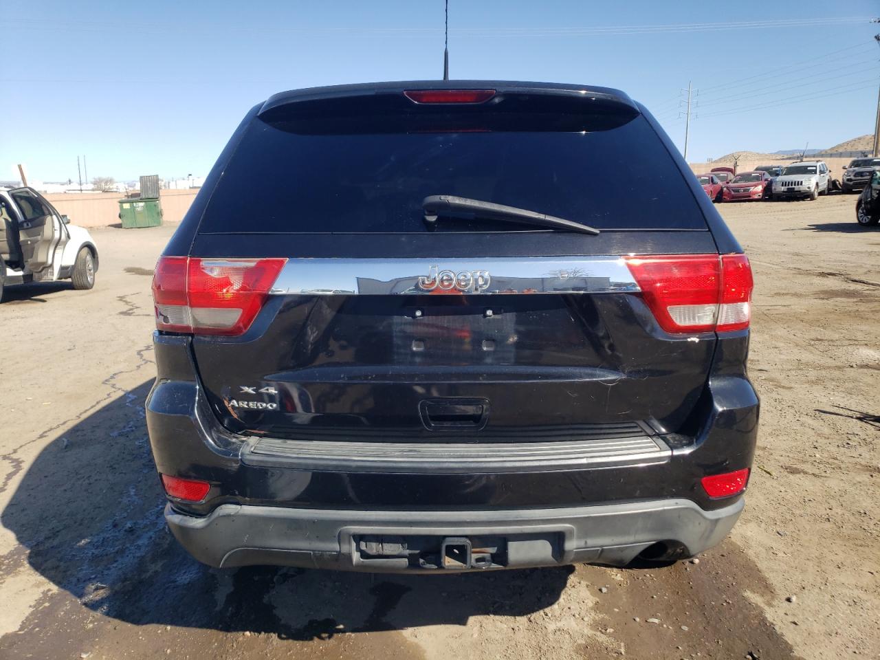 2011 Jeep Grand Cherokee VIN 1J4RR4GG5BC514557 Copart auction photo, side / front end damage thumbnail 6