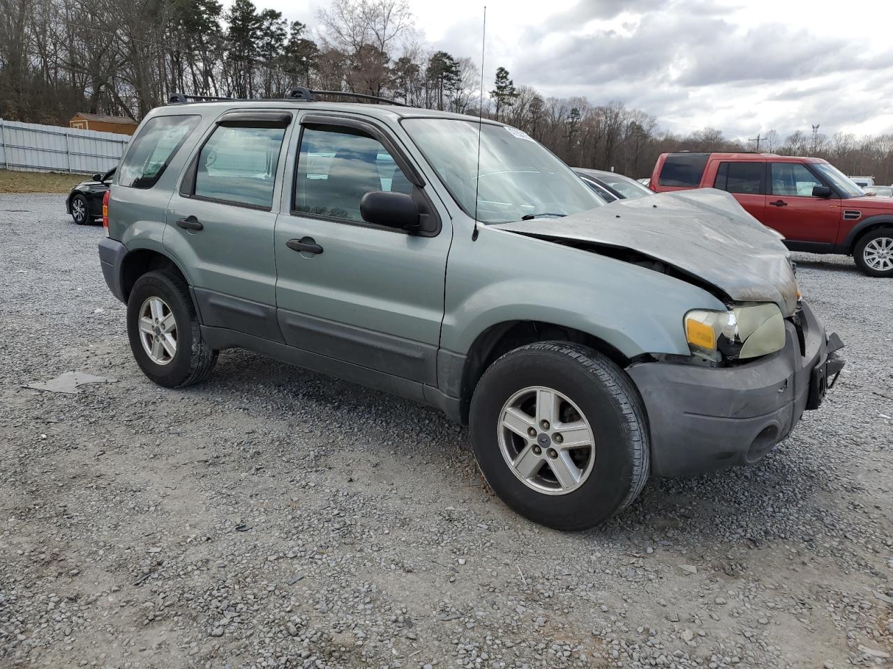 2005 Ford Escape VIN 1FMYU92Z05KA21168 Copart auction photo, front end / mechanical damage thumbnail 4