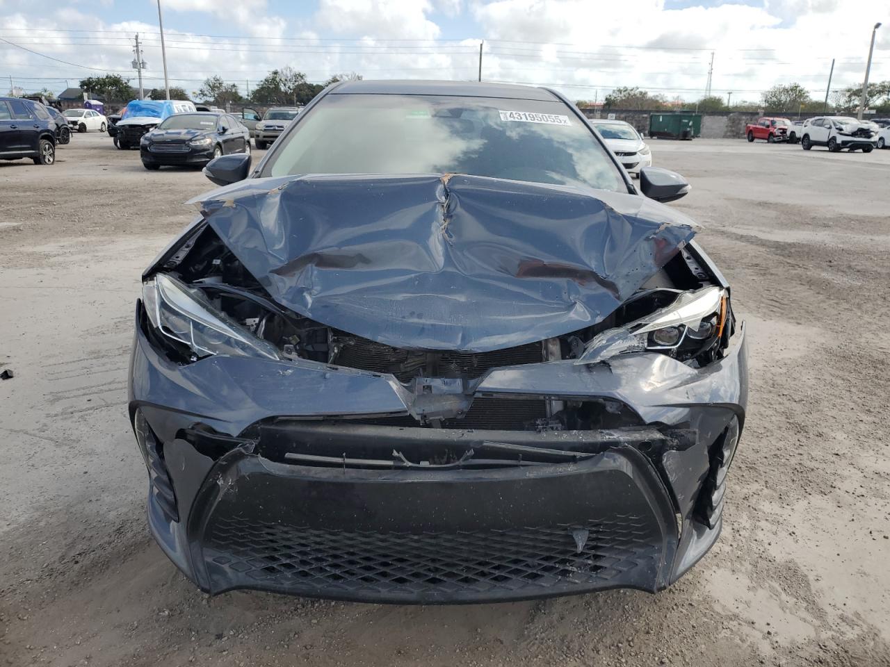2019 Toyota Corolla VIN 5YFBURHE2KP867443 Copart auction photo, front end damage thumbnail 5