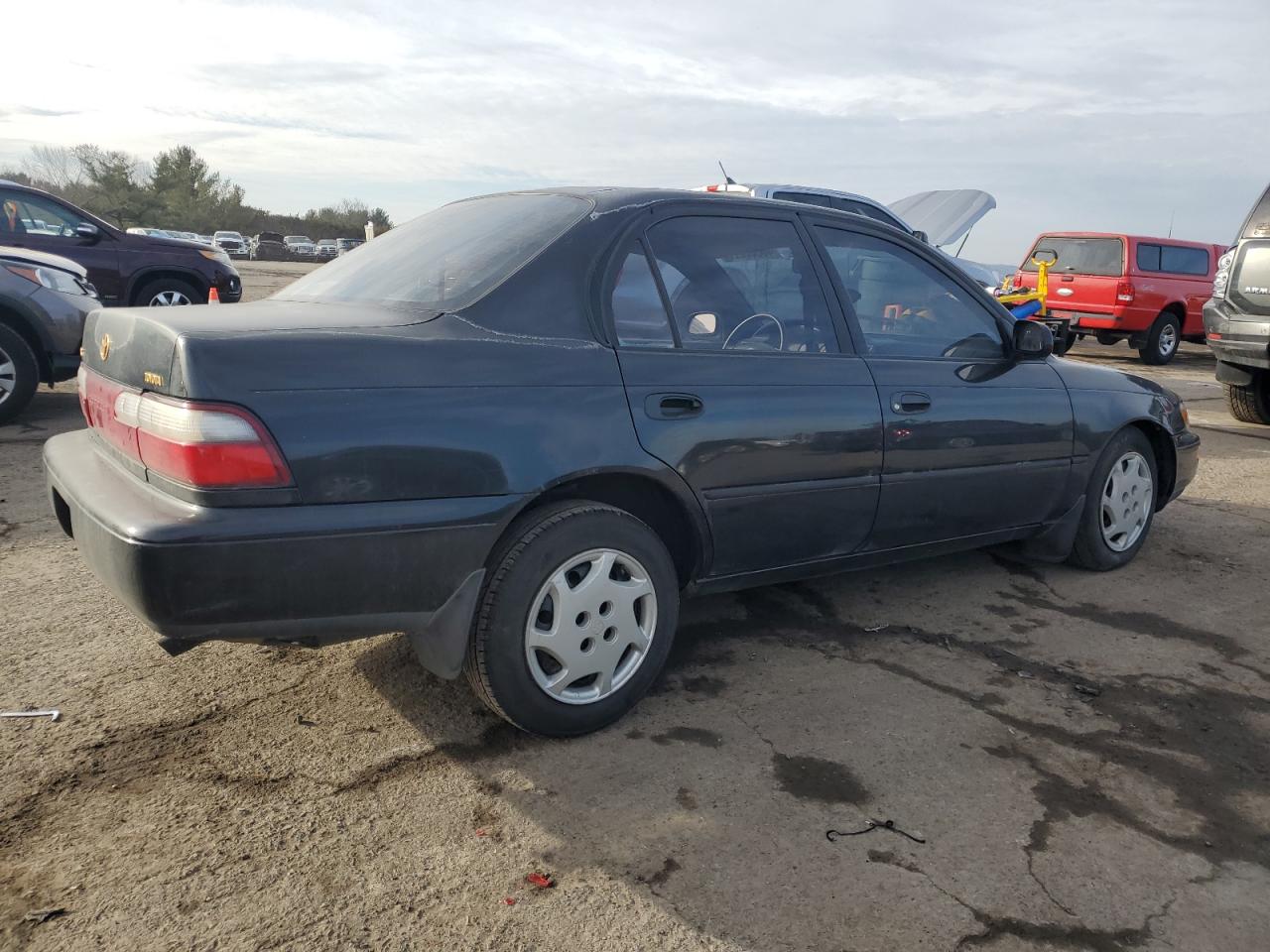 1997 Toyota Corolla VIN 2T1BB02E5VC205175 Copart auction photo, side / front end damage thumbnail 3