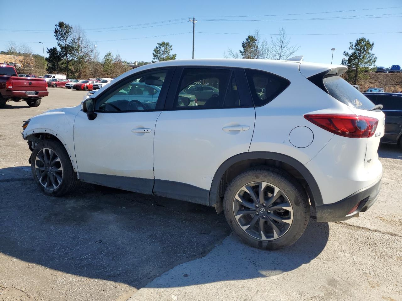 2016 Mazda CX-5 VIN JM3KE2DYXG0735303 Copart auction photo, front end / side damage thumbnail 2
