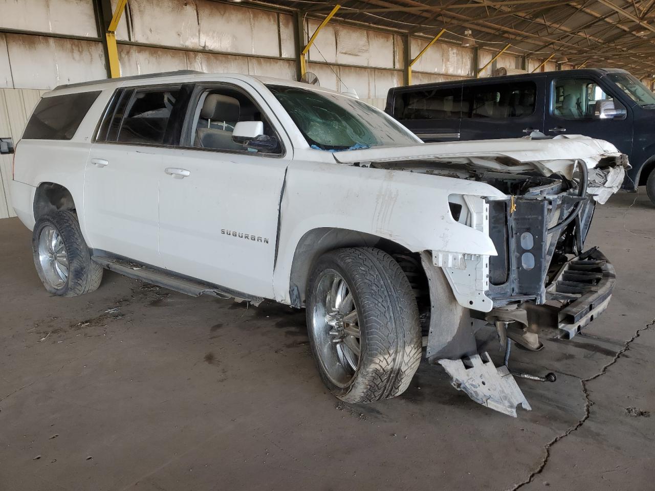 2015 Chevrolet Suburban VIN 1GNSCJKC3FR585391 Copart auction photo, all over damage thumbnail 4