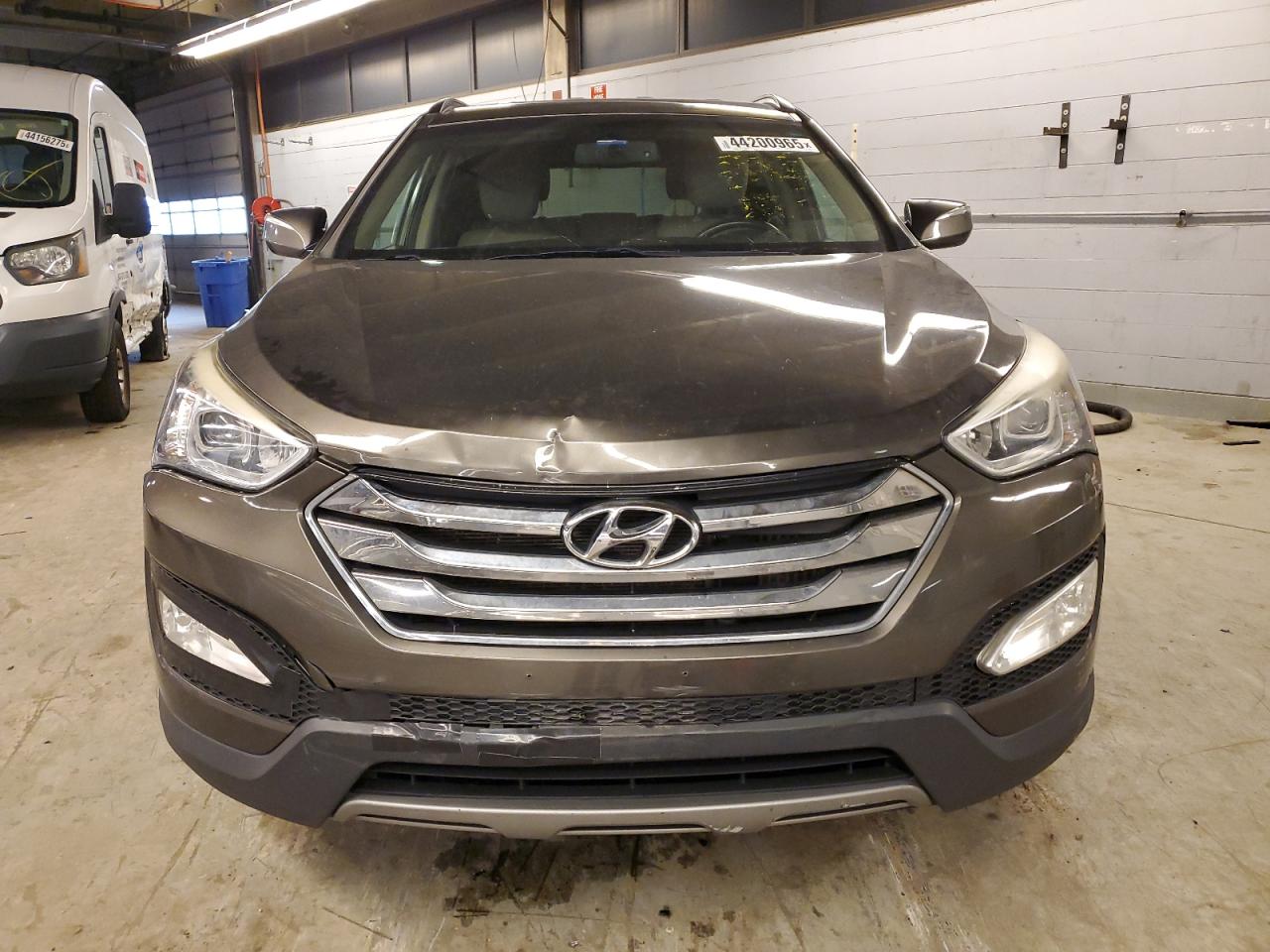 2013 Hyundai Santa Fe VIN 5XYZU3LA0DG045537 Copart auction photo, front end / mechanical damage thumbnail 5