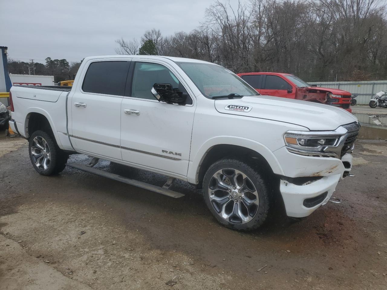 2021 RAM 1500 VIN 1C6SRFHM5MN748140 Copart auction photo, front end / side damage thumbnail 4