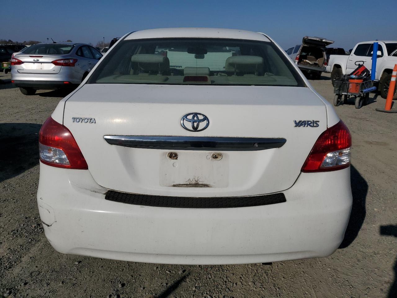 2009 Toyota Yaris VIN JTDBT903291316084 Copart auction photo, side damage thumbnail 6