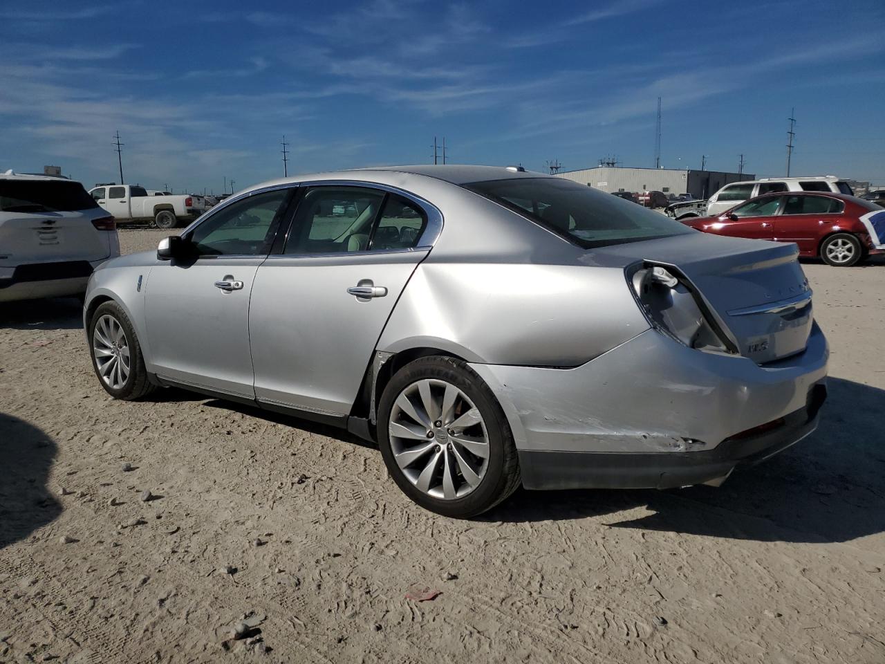 2016 Lincoln MKS VIN 1LNHL9DK2GG601403 Copart auction photo, rear end / minor dent/scratches damage thumbnail 2
