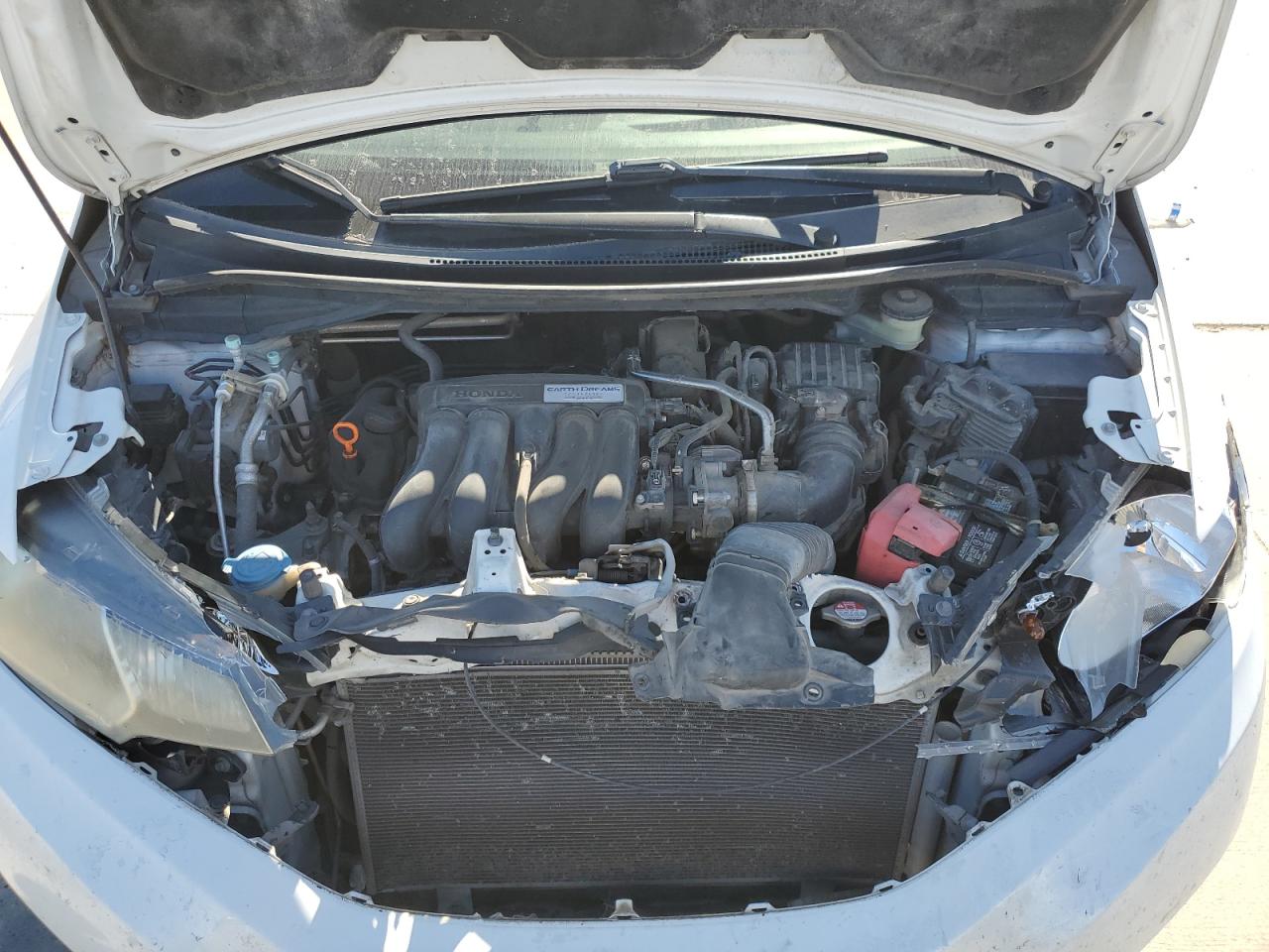 2016 Honda Fit VIN JHMGK5H58GX010748 Copart auction photo, all over damage thumbnail 11