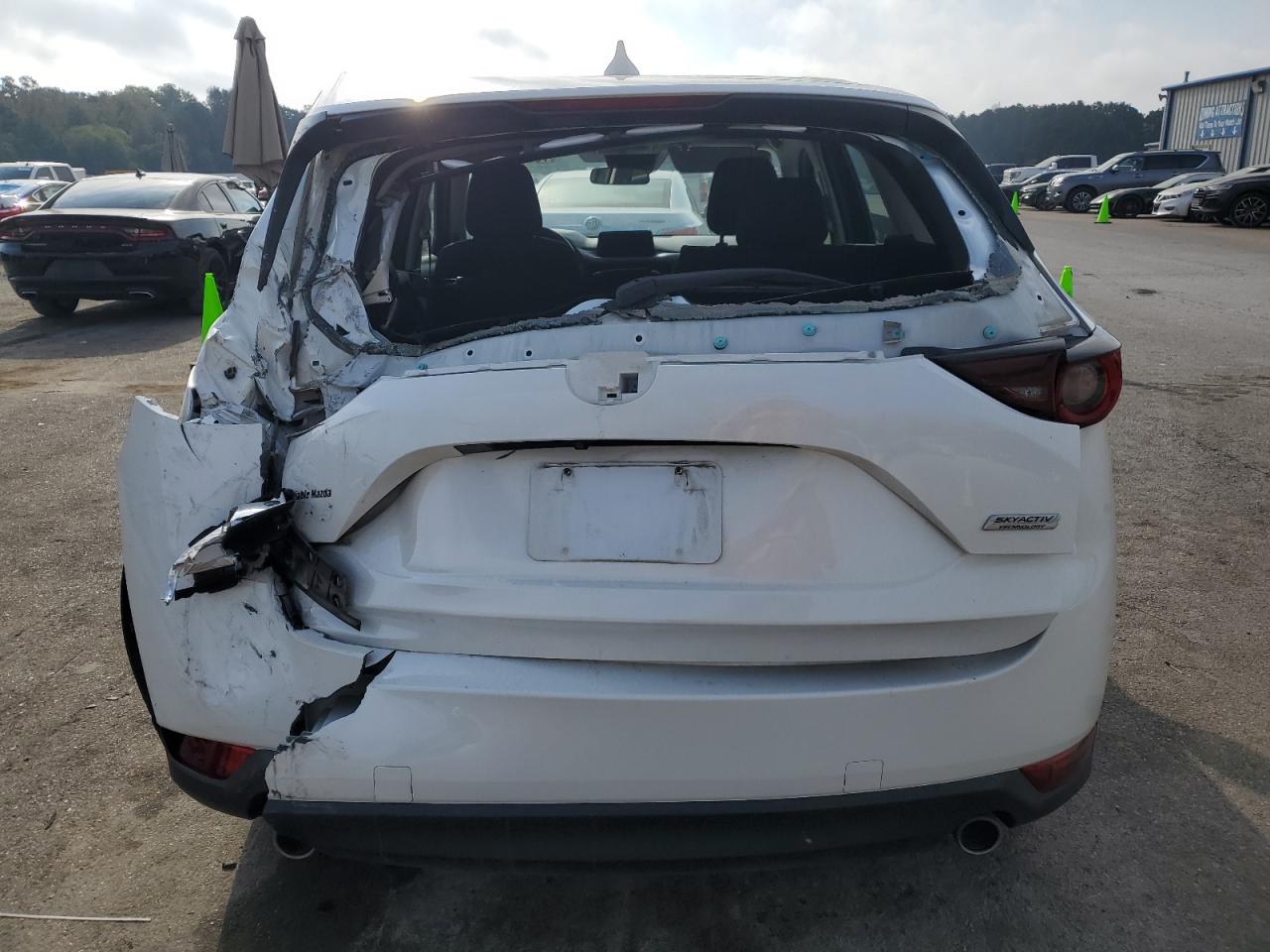 2019 Mazda CX-5 VIN JM3KFABM7K0667333 Copart auction photo, rear end / side damage thumbnail 6