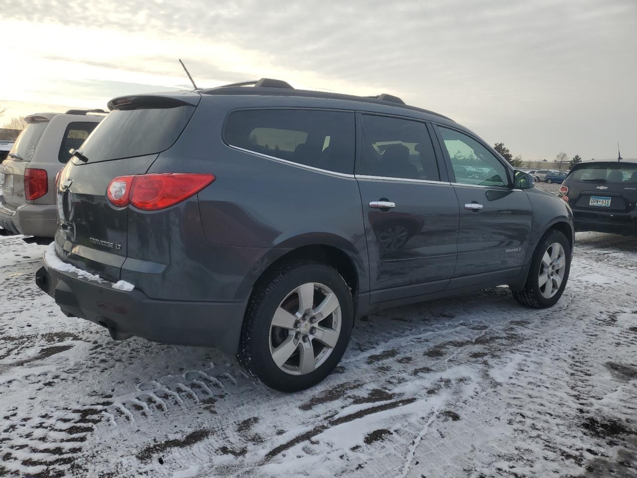 2009 Chevrolet Traverse VIN 1GNEV23D89S100597 Copart auction photo, rear end damage thumbnail 3