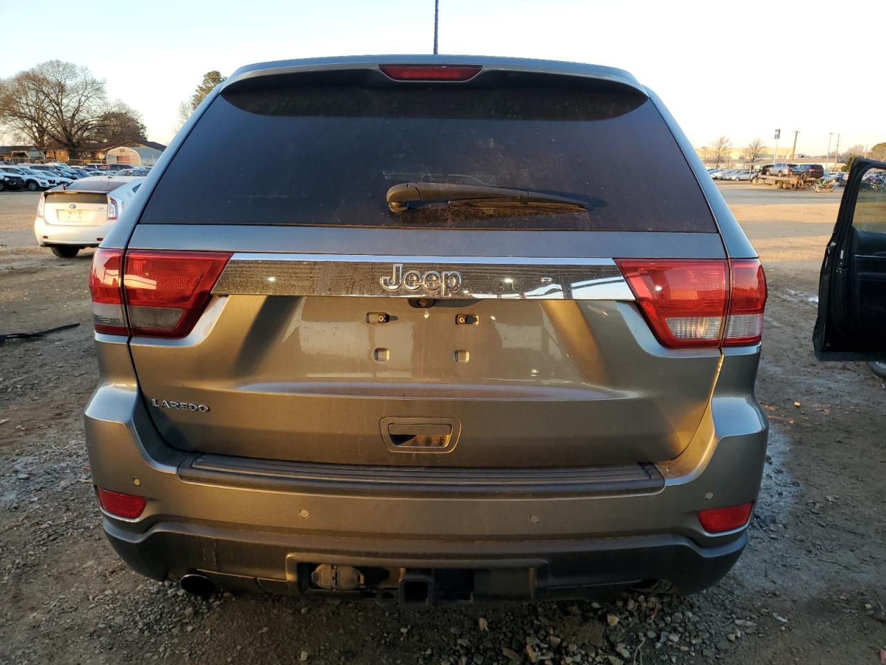 2012 Jeep Grand Cherokee VIN 1C4RJEAT6CC361732 Copart auction photo, front end / side damage thumbnail 6