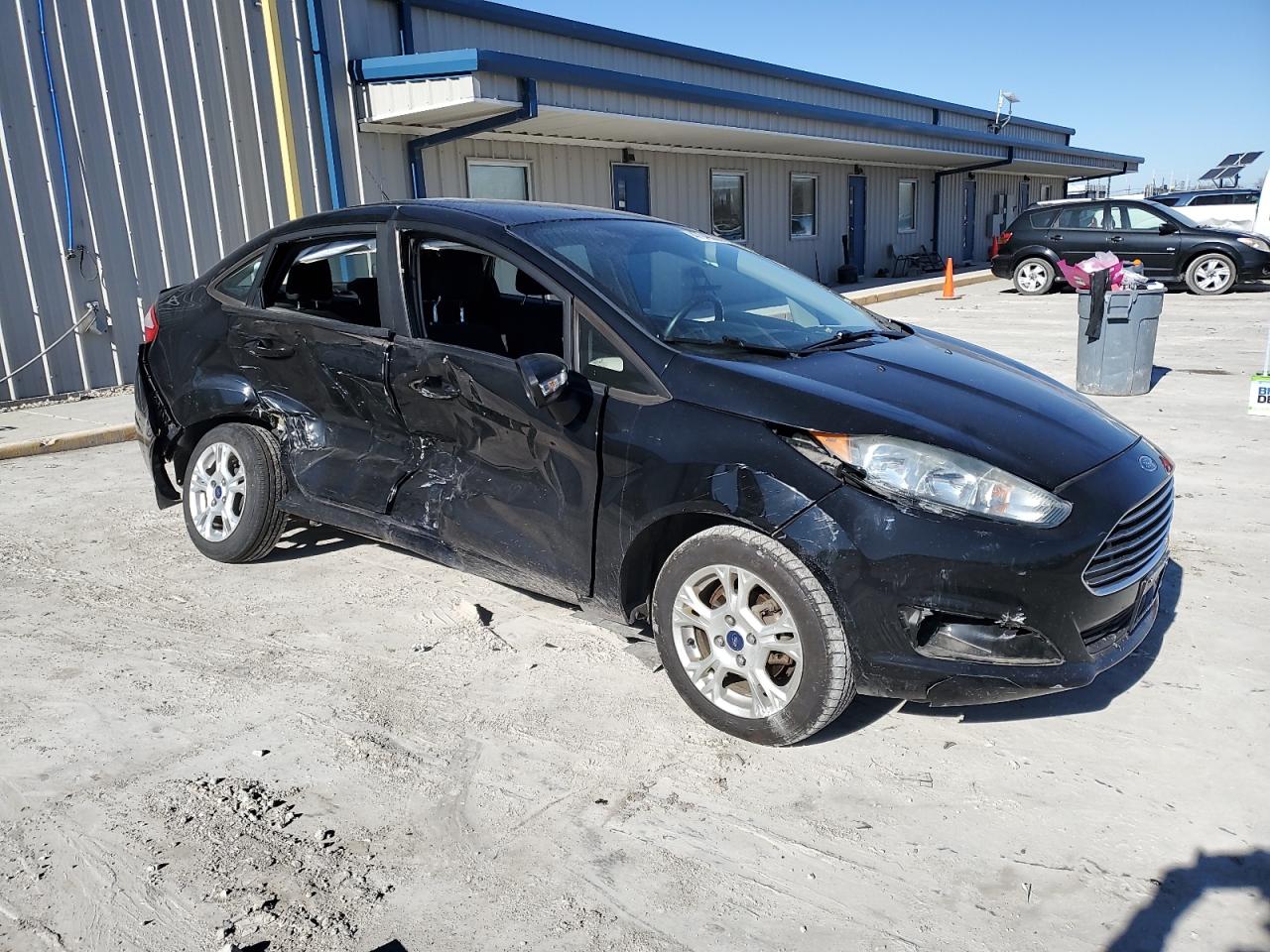 2016 Ford Fiesta VIN 3FADP4BJ1GM144390 Copart auction photo, side / mechanical damage thumbnail 4