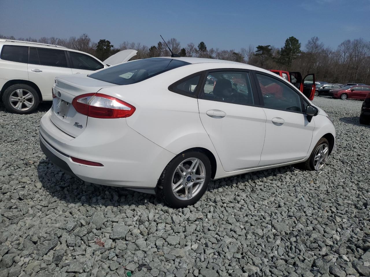 2019 Ford Fiesta VIN 3FADP4BJ0KM156104 Copart auction photo, side damage thumbnail 3