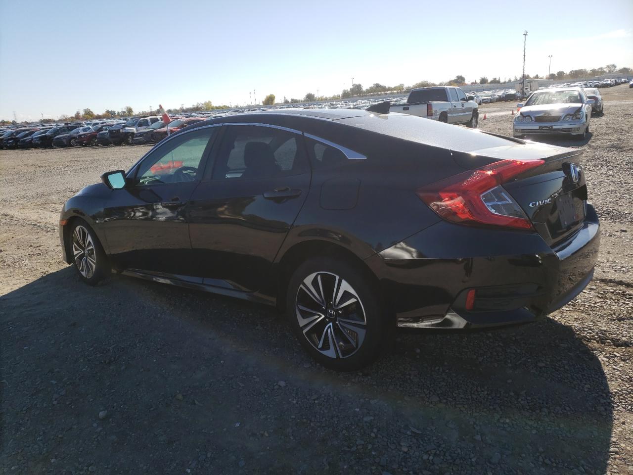 2016 Honda Civic VIN 2HGFC1F42GH640929 Copart auction photo, front end / side damage thumbnail 2