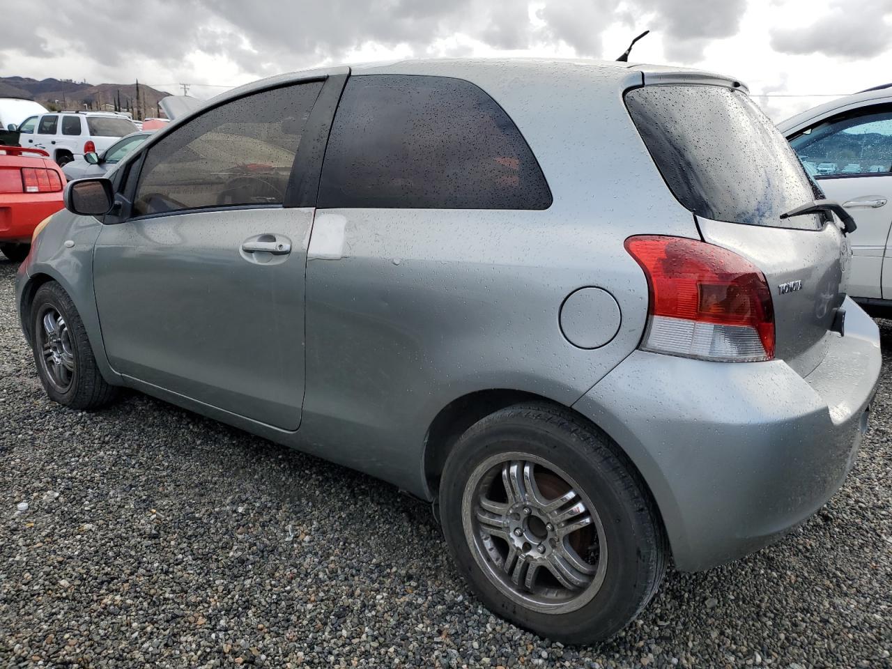 2010 Toyota Yaris VIN JTDJT4K36A5297404 Copart auction photo, all over damage thumbnail 2