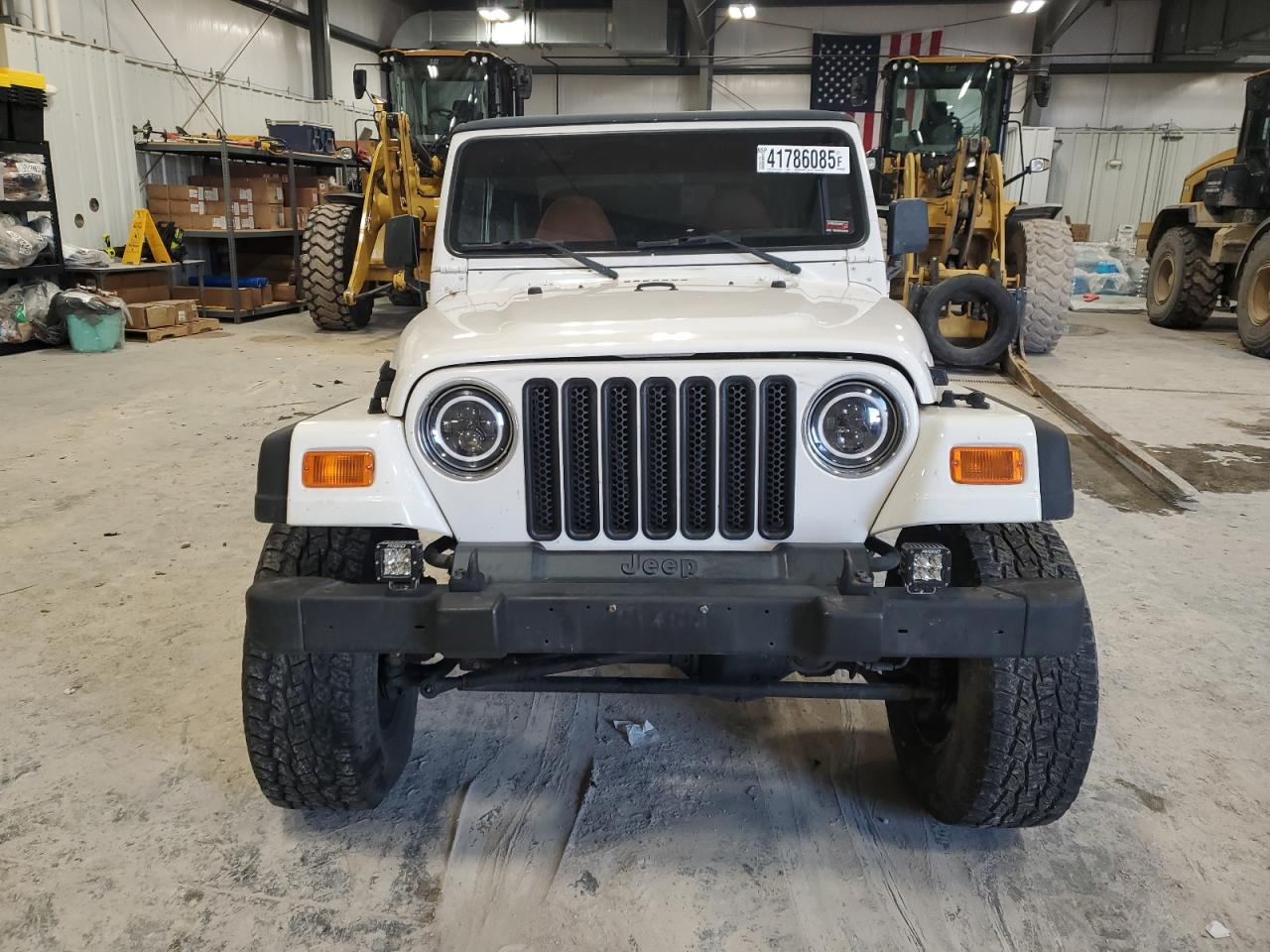 2000 Jeep Wrangler VIN 1J4FA49S7YP706141 Copart auction photo, undercarriage damage thumbnail 5