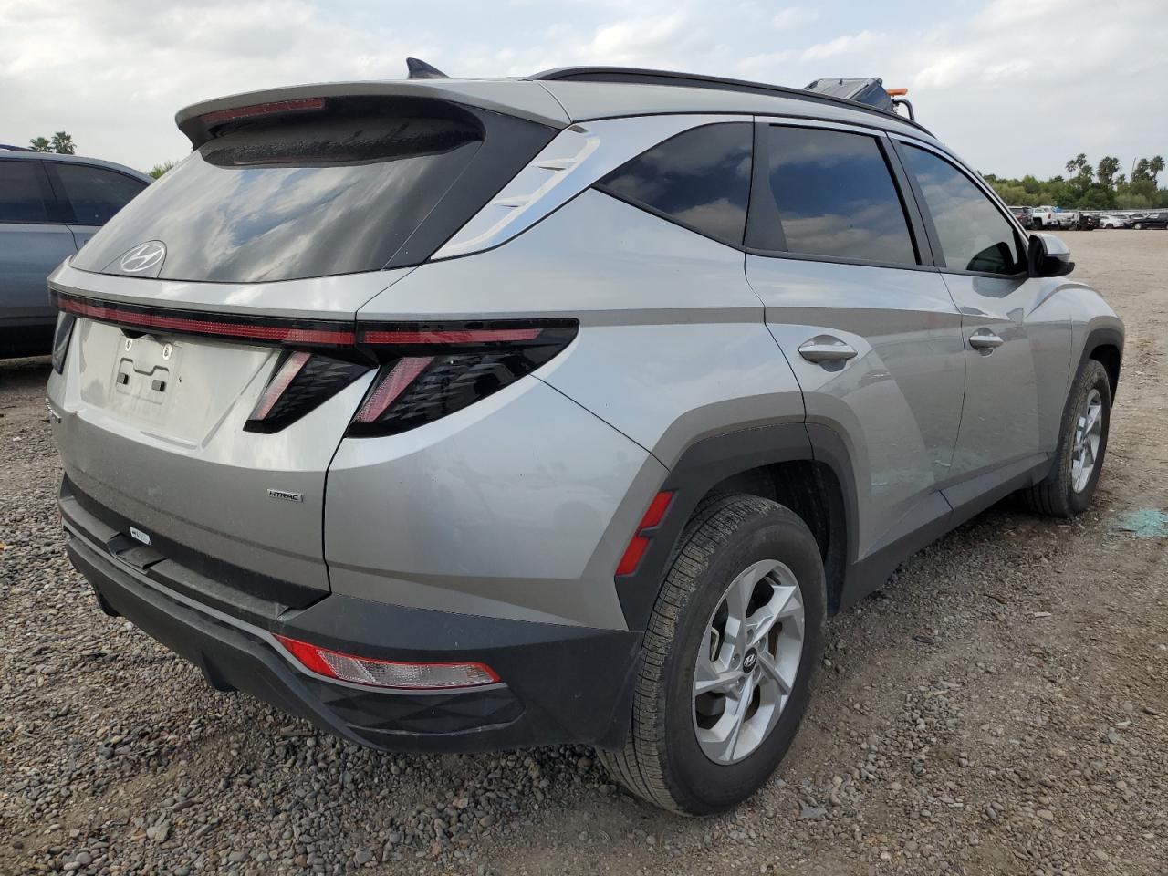 2023 Hyundai Tucson VIN 5NMJBCAE8PH265057 Copart auction photo, side / minor dent/scratches damage thumbnail 3