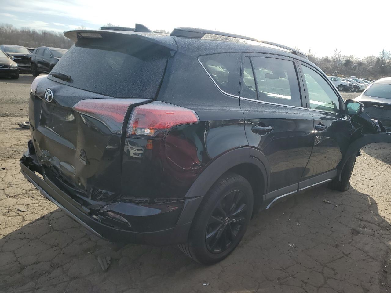 2018 Toyota RAV 4 VIN 2T3RFREV6JW774815 Copart auction photo, front end / rear end damage thumbnail 3