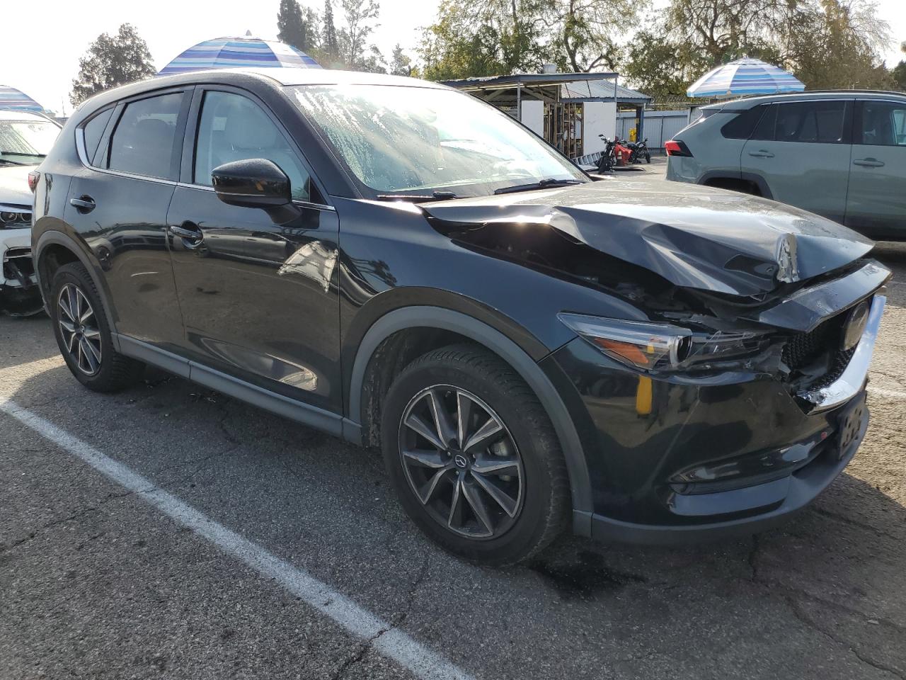 2018 Mazda CX-5 VIN JM3KFADM9J0337978 Copart auction photo, front end / minor dent/scratches damage thumbnail 4