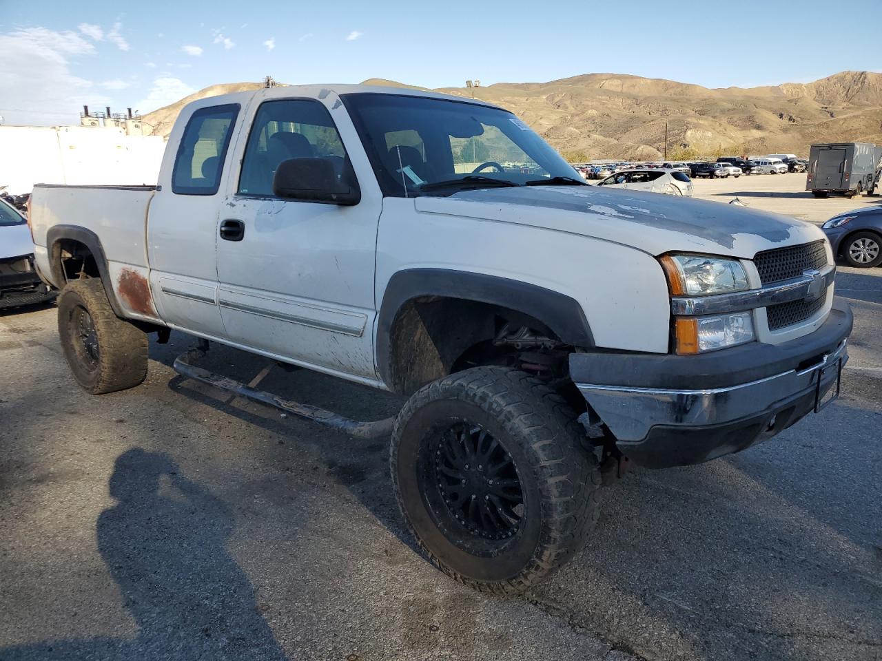 2003 Chevrolet Silverado VIN 2GCEC19X831392379 Copart auction photo, vandalism / minor dent/scratches damage thumbnail 4