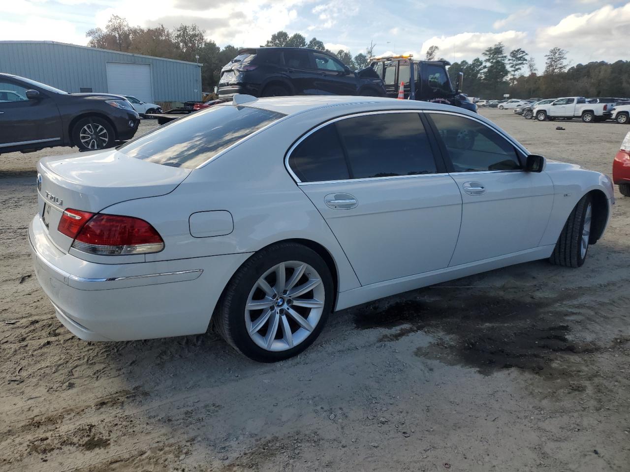2007 BMW 7er VIN WBAHN83597DT75248 Copart auction photo, minor dent/scratches damage thumbnail 3
