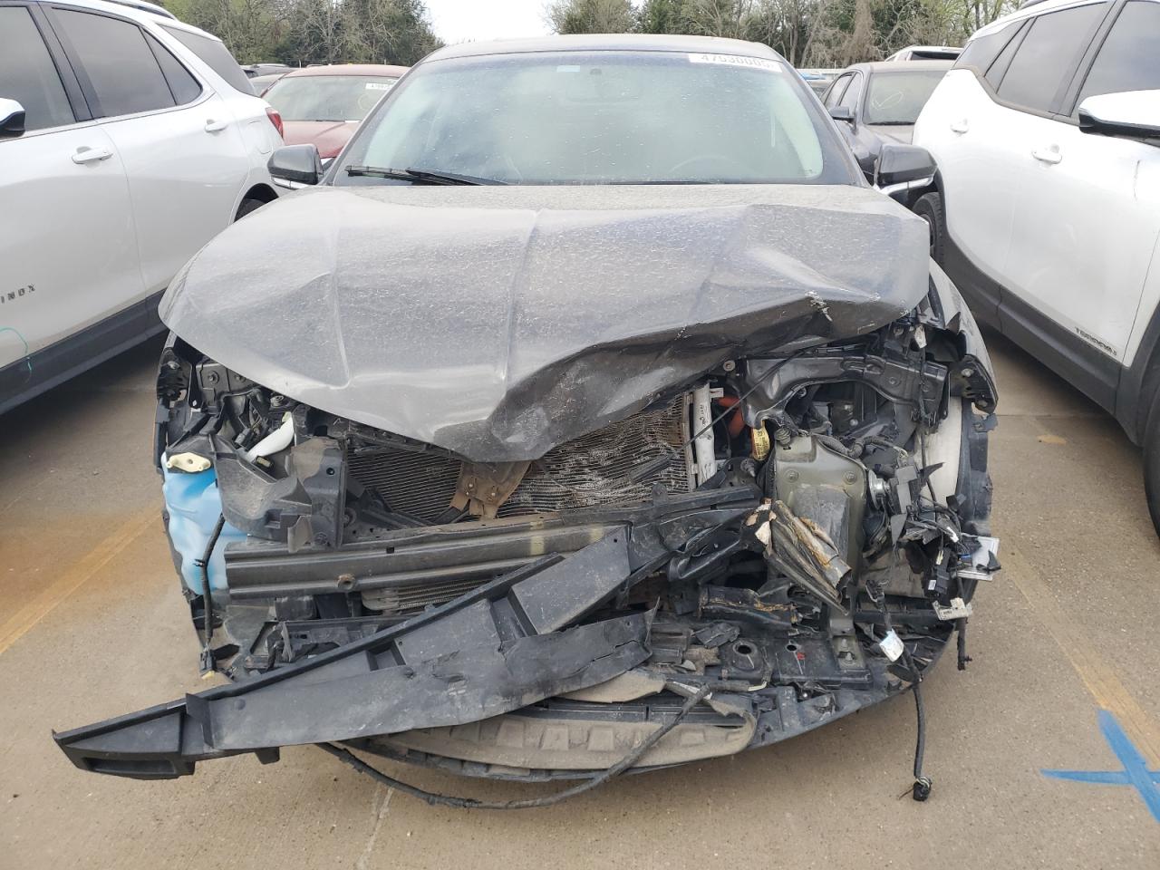 2016 Lincoln MKZ VIN 3LN6L2LUXGR618086 Copart auction photo, front end / hail damage thumbnail 5