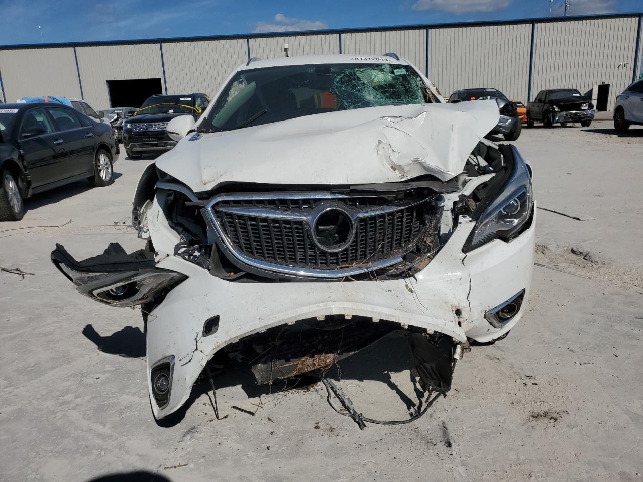 2020 Buick Envision VIN LRBFXCSA7LD044909 Copart auction photo, front end damage thumbnail 5
