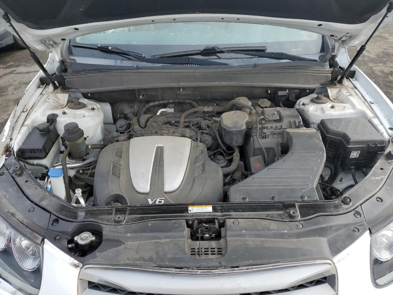 2012 Hyundai Santa Fe VIN 5XYZKDAG7CG152828 Copart auction photo, all over / side damage thumbnail 11