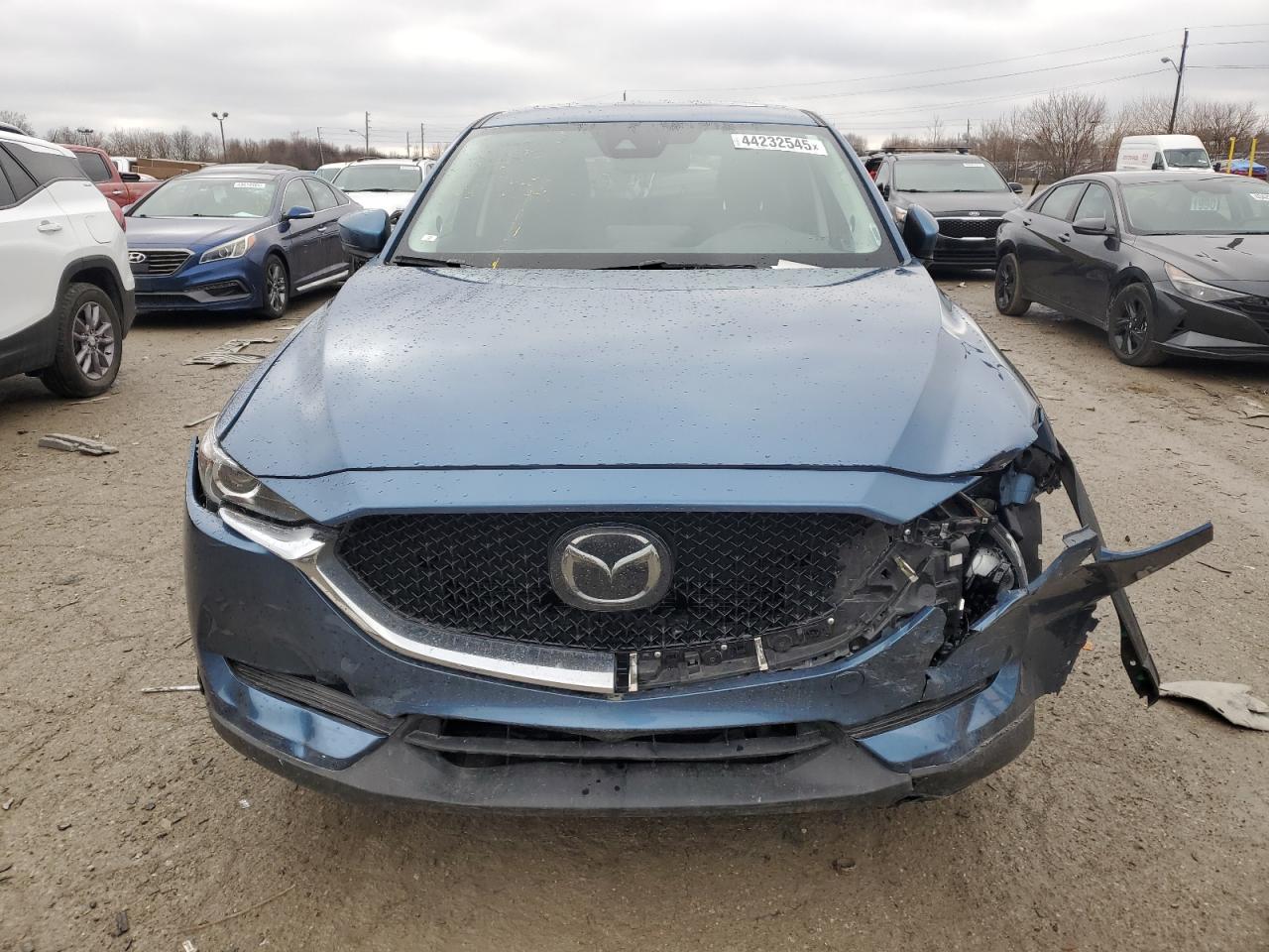 2021 Mazda CX-5 VIN JM3KFBCM4M0468618 Copart auction photo, front end / minor dent/scratches damage thumbnail 5