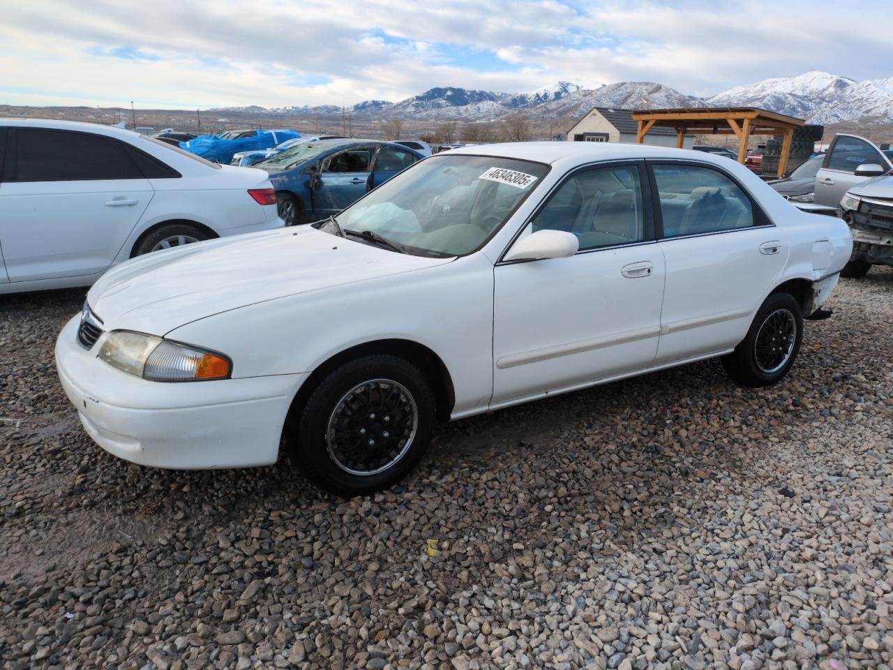 1999 Mazda 626 VIN 1YVGF22C9X5887587 - Copart auction photo