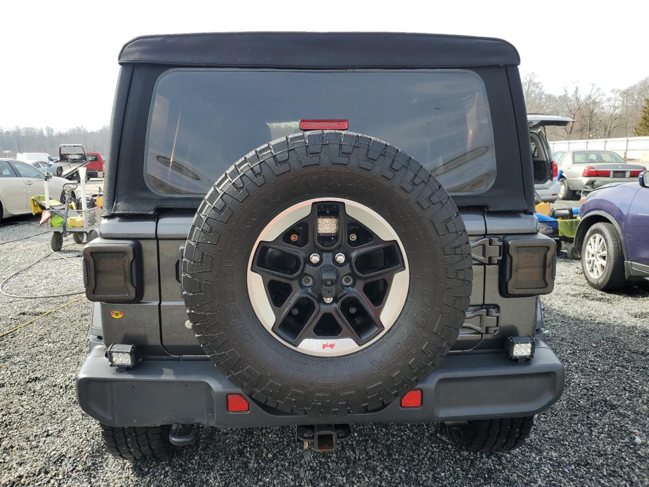 2018 Jeep Wrangler VIN 1C4HJXEG4JW134698 Copart auction photo, side damage thumbnail 6