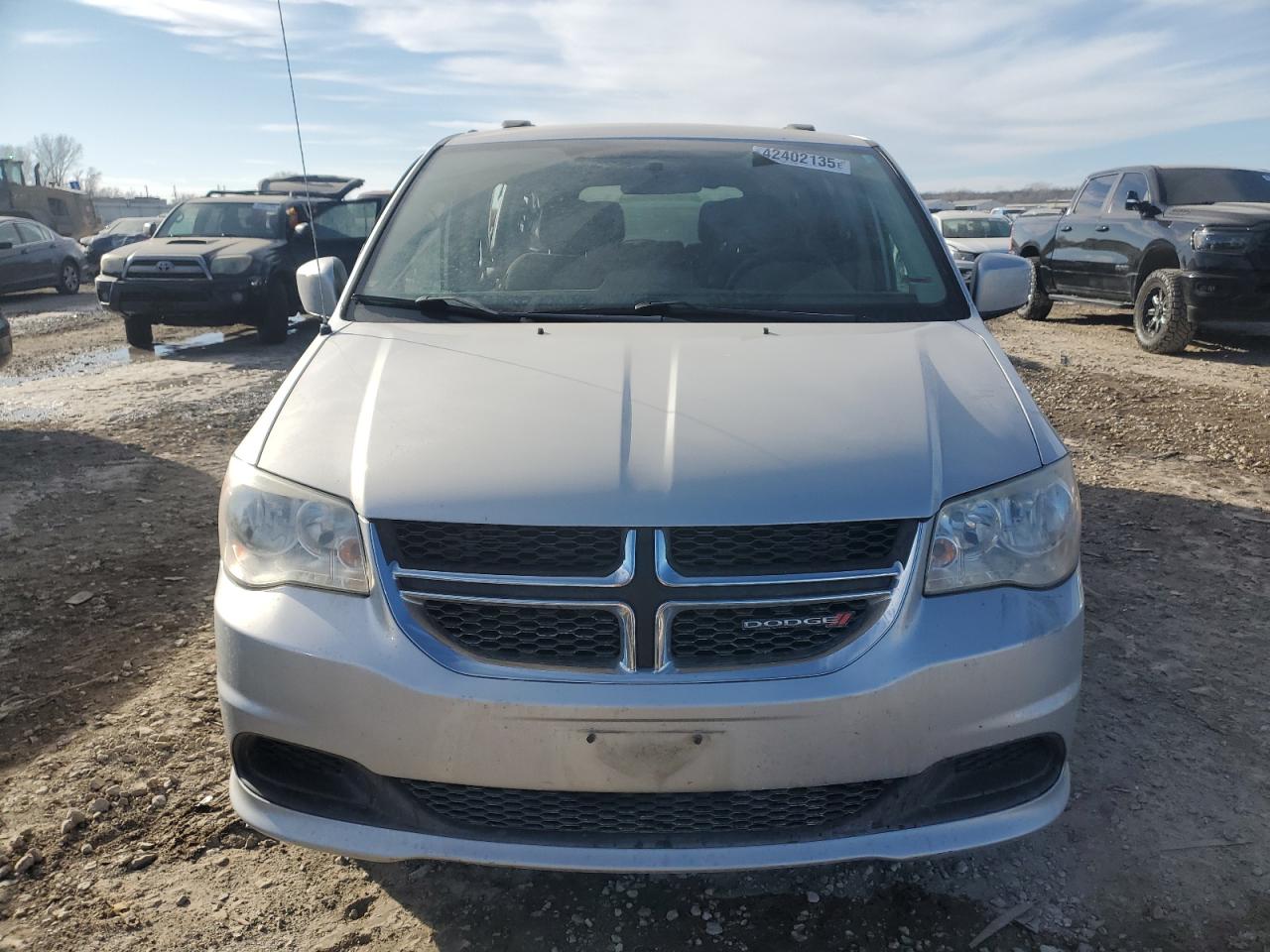 2012 Dodge Caravan VIN 2C4RDGCG5CR297001 Copart auction photo, side damage thumbnail 5