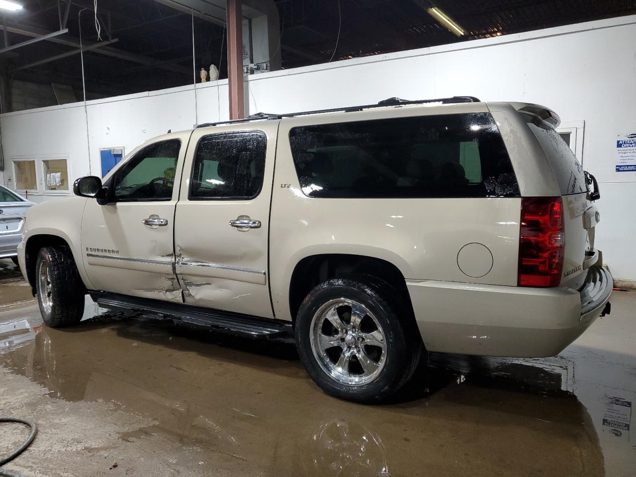 2009 Chevrolet Suburban VIN 1GNFK36Y59R128074 Copart auction photo, side / mechanical damage thumbnail 2