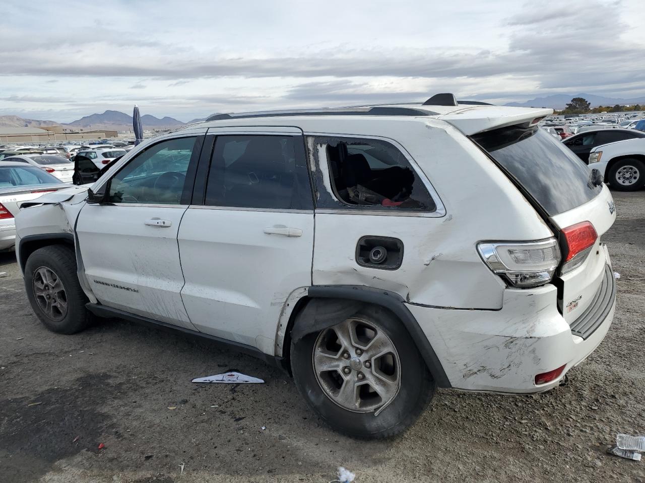 2016 Jeep Grand Cherokee VIN 1C4RJFAG2GC470994 Copart auction photo, all over damage thumbnail 2