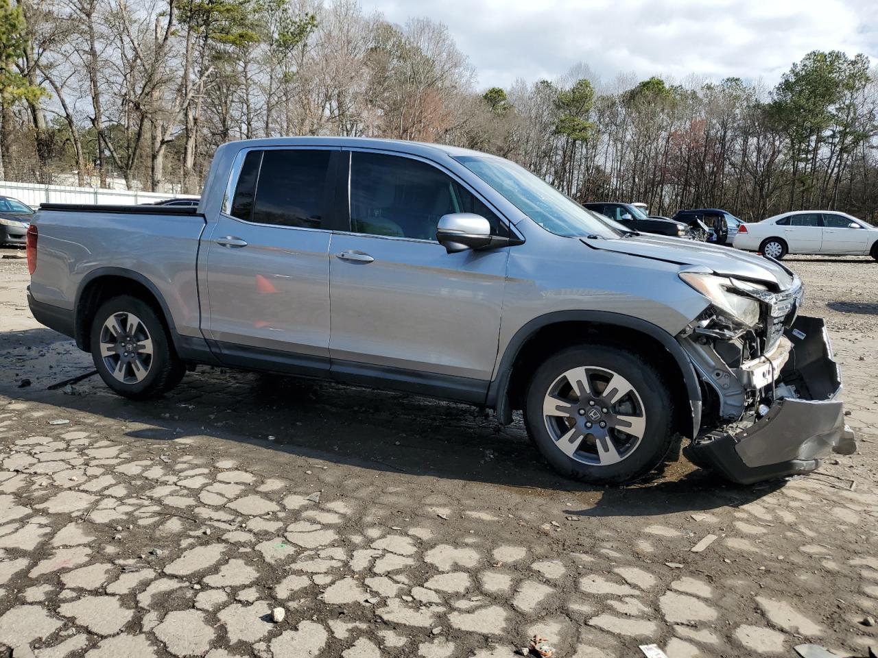 2017 Honda Ridgeline VIN 5FPYK2F67HB010002 Copart auction photo, front end / top/roof damage thumbnail 4