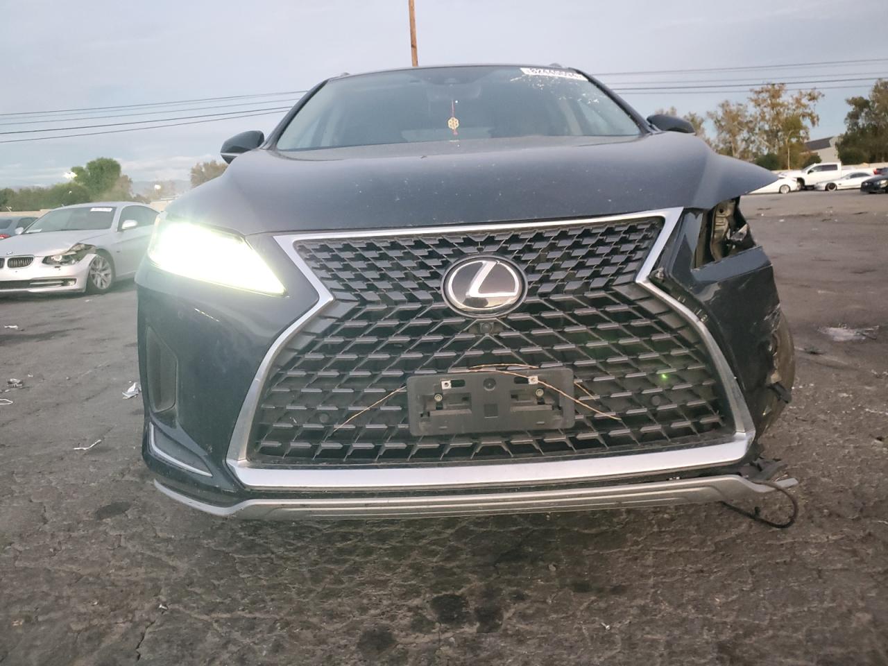 2022 Lexus RX VIN 2T2HZMDA0NC336064 Copart auction photo, front end / side damage thumbnail 5