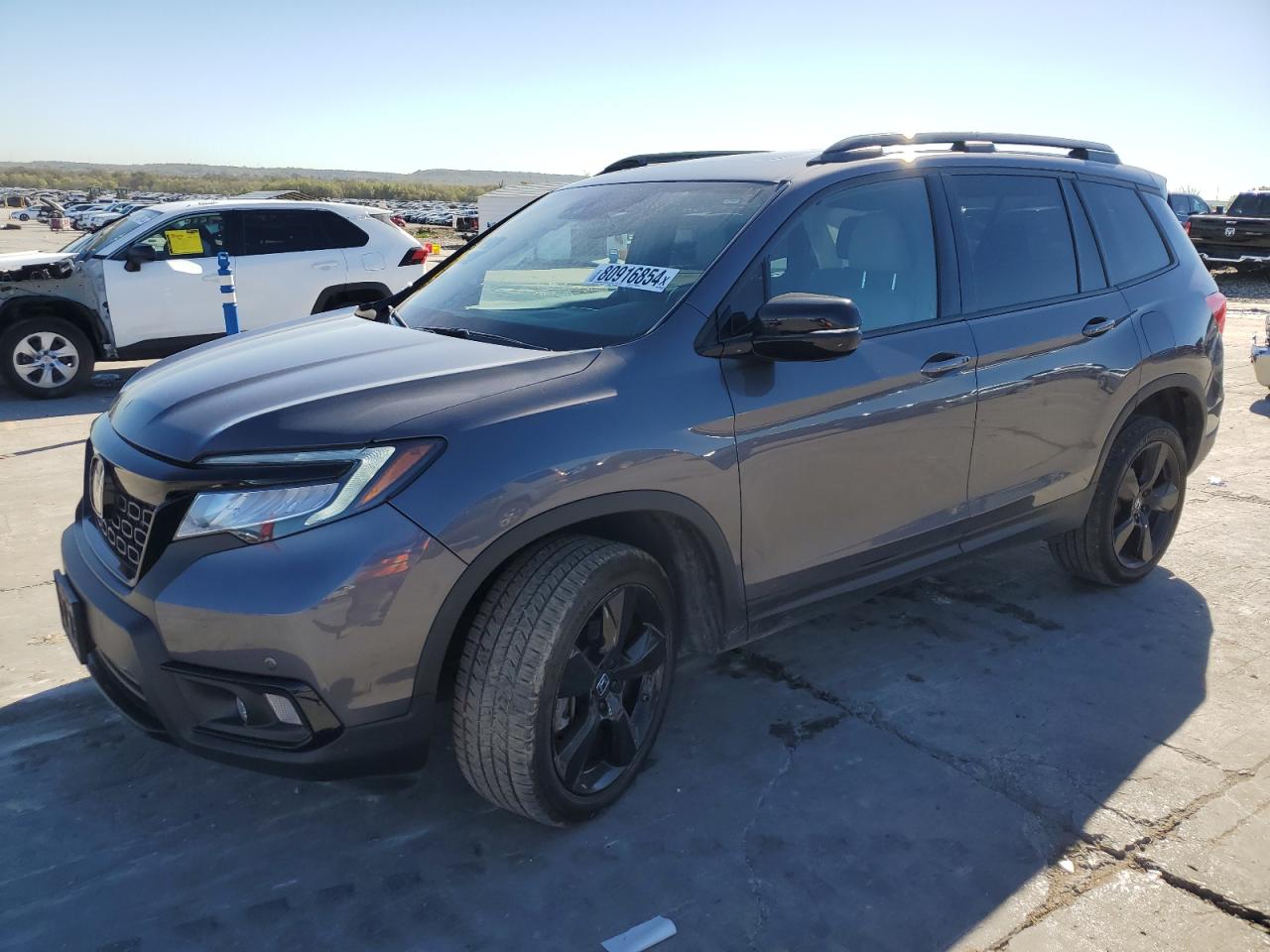 2021 Honda Passport VIN 5FNYF8H04MB034700