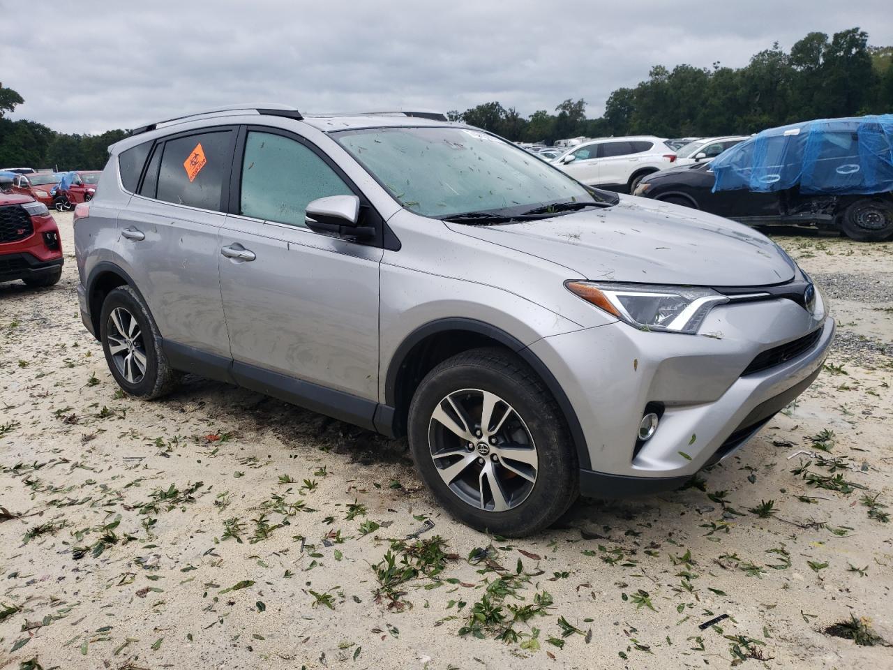 2017 Toyota RAV 4 VIN 2T3WFREV7HW394301 Copart auction photo, water/flood / minor dent/scratches damage thumbnail 4
