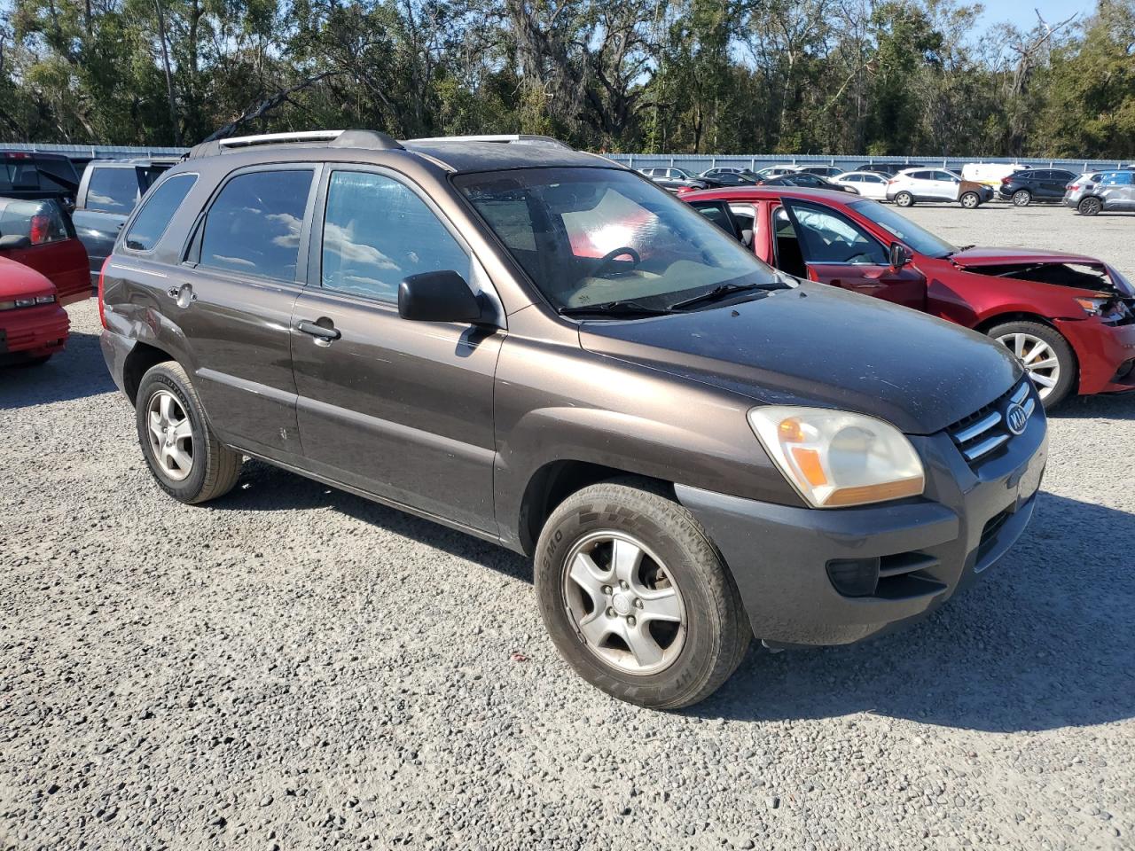 2006 KIA Sportage VIN KNDJF724767240870 Copart auction photo, side / front end damage thumbnail 4