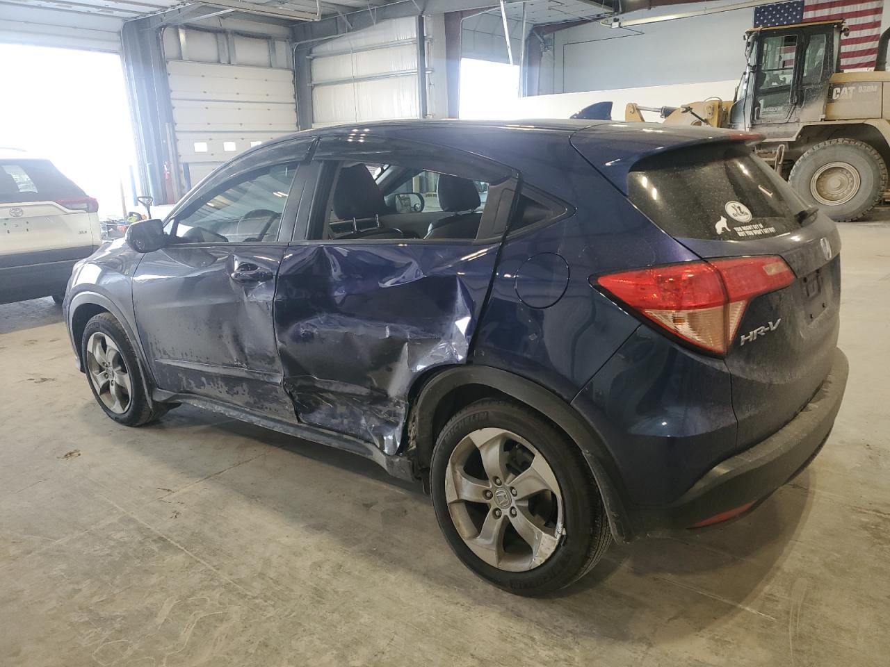 2016 Honda HR-V VIN 3CZRU6H31GM716520 Copart auction photo, side / rear end damage thumbnail 2