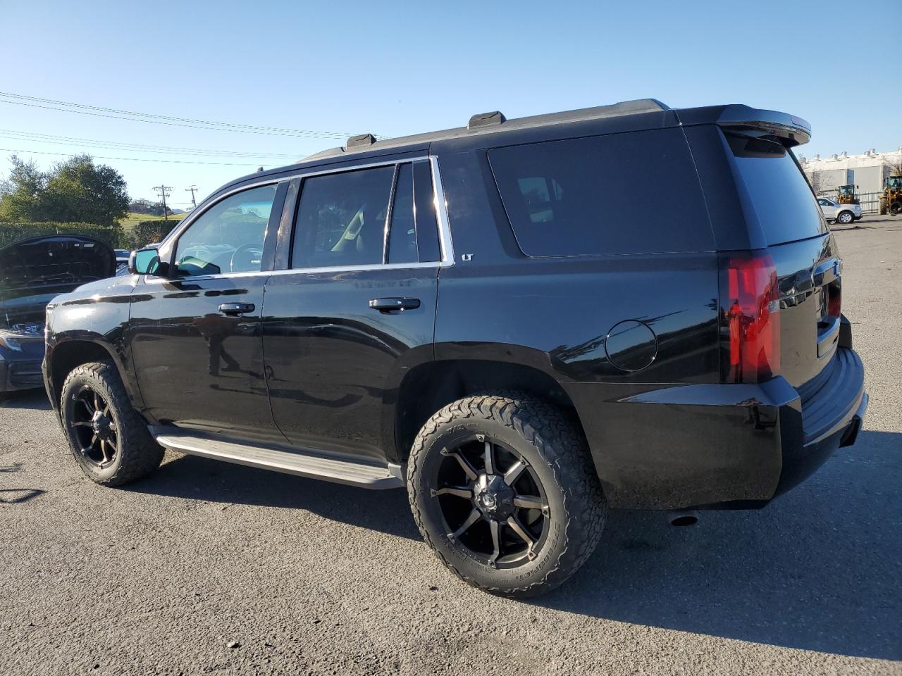2015 Chevrolet Tahoe VIN 1GNSKBKC7FR654429 Copart auction photo, minor dent/scratches damage thumbnail 2