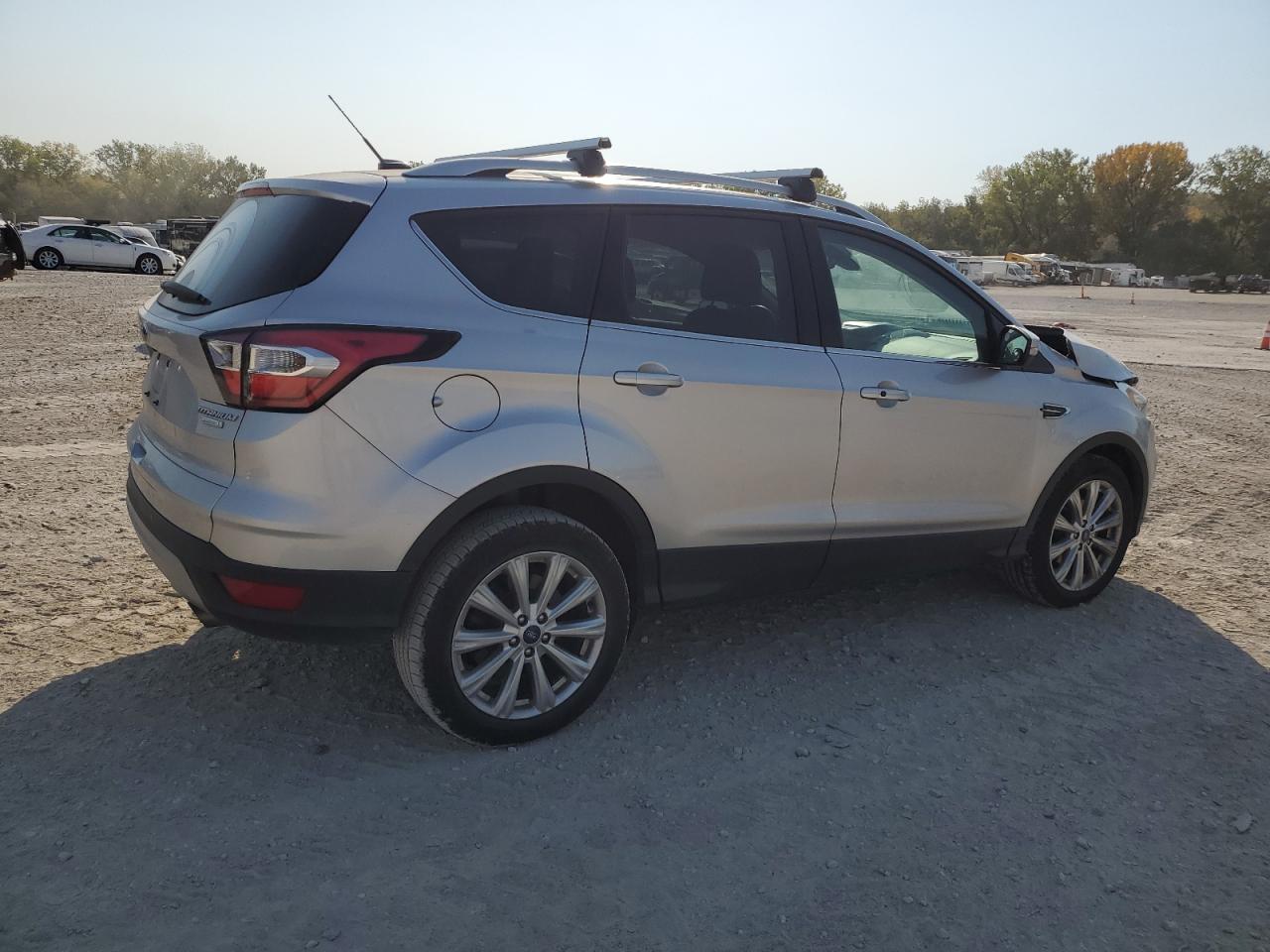 2017 Ford Escape VIN 1FMCU0JDXHUC48145 Copart auction photo, front end / minor dent/scratches damage thumbnail 3