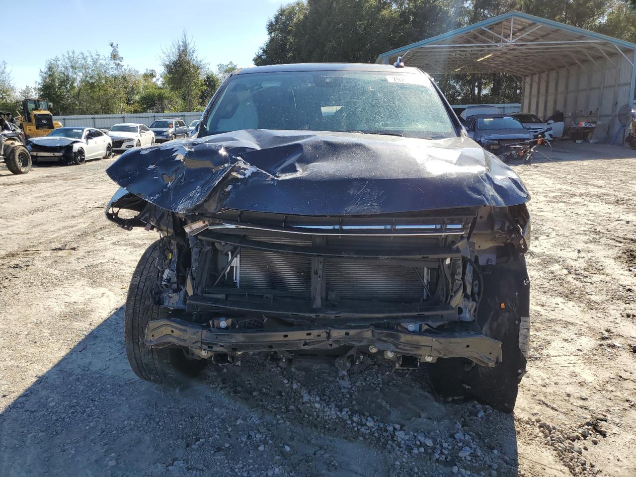 2023 Chevrolet Tahoe VIN 1GNSCSKD0PR110250 Copart auction photo, rollover damage thumbnail 5