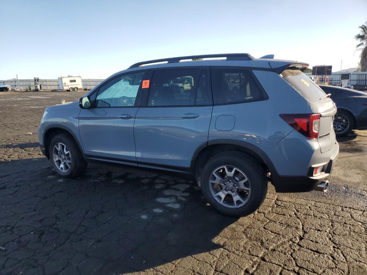 2022 Honda Passport VIN 5FNYF8H68NB001625 Copart auction photo, vandalism damage thumbnail 2