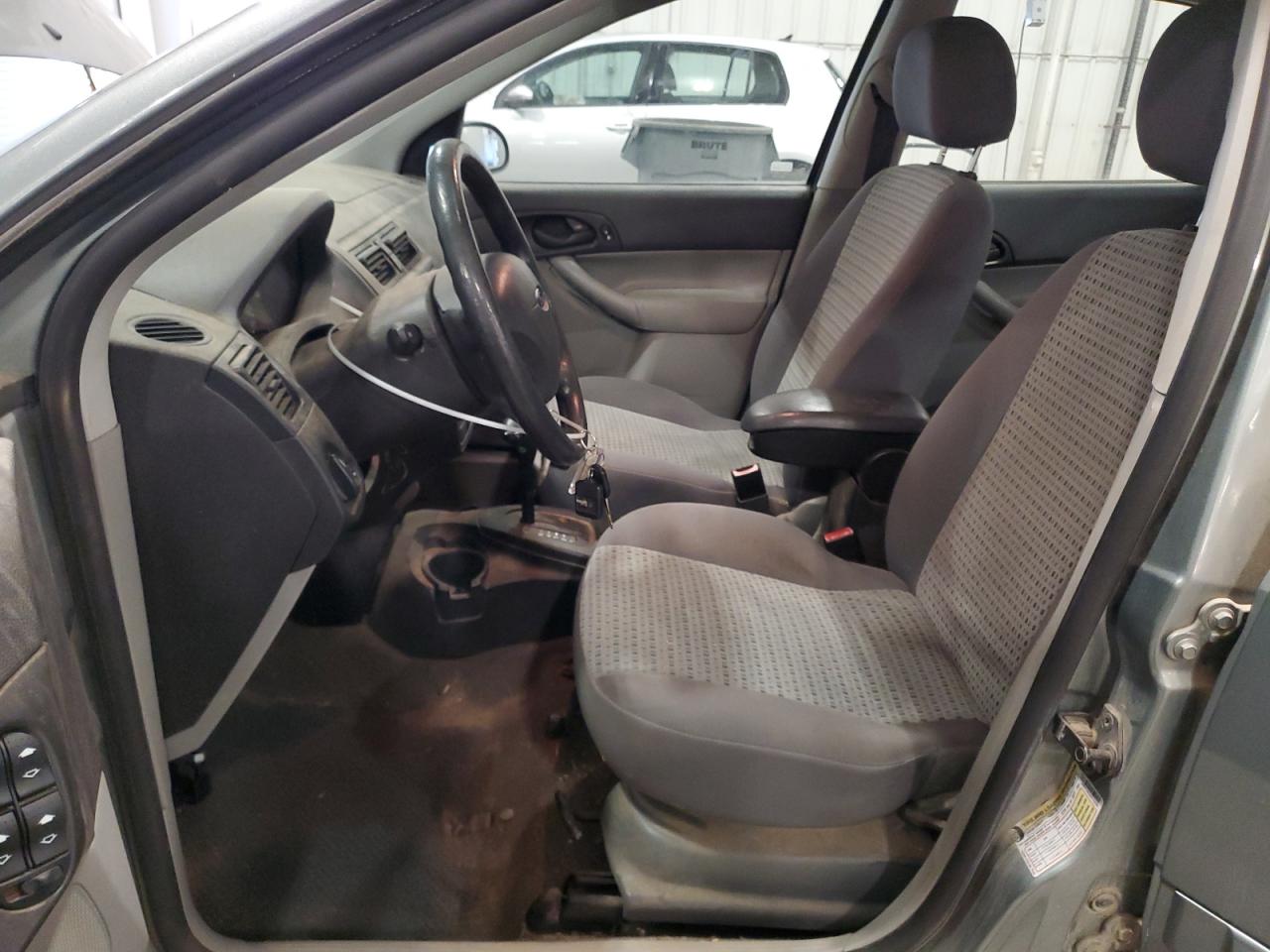 2006 Ford Focus VIN 1FAFP34N36W234688 Copart auction photo, hail damage thumbnail 7