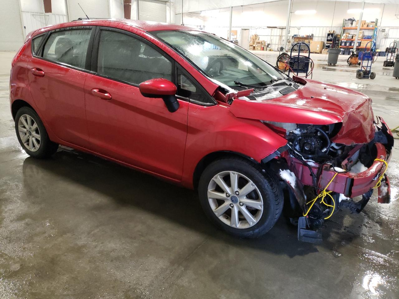 2012 Ford Fiesta VIN 3FADP4EJ8CM219883 Copart auction photo, front end / hail damage thumbnail 4
