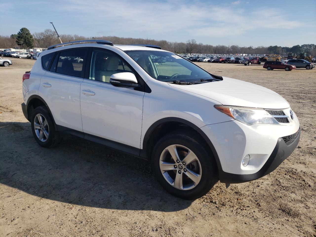 2015 Toyota RAV 4 VIN 2T3WFREV0FW215996 Copart auction photo, rear end / side damage thumbnail 4