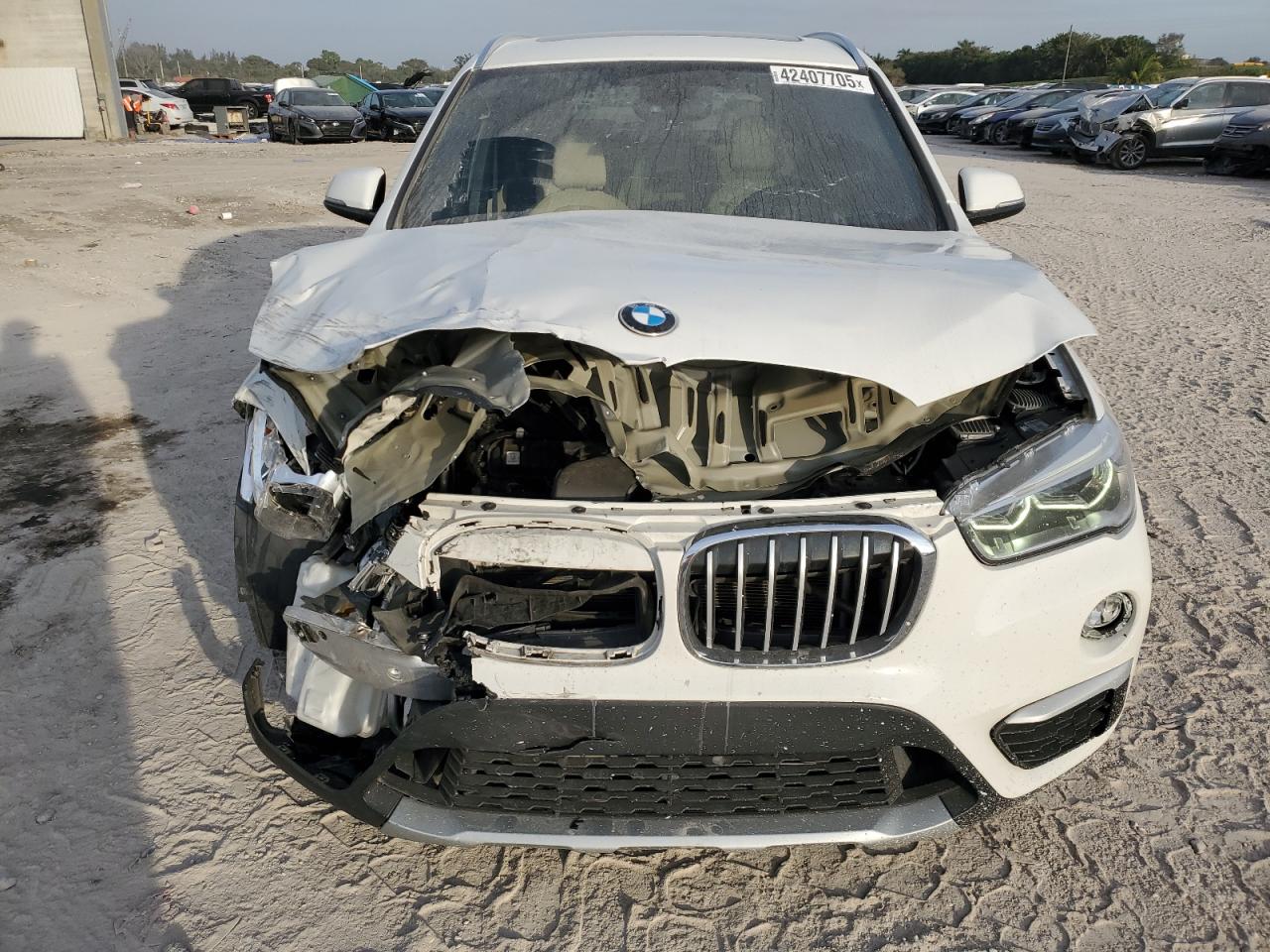 2016 BMW X1 VIN WBXHT3Z36G4A48815 Copart auction photo, front end / minor dent/scratches damage thumbnail 5